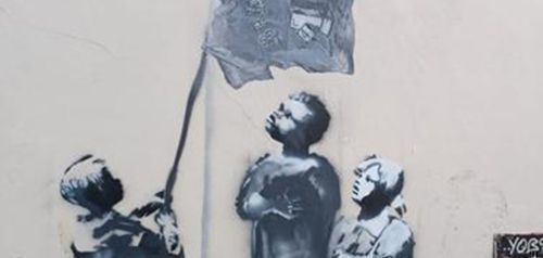Τοιχογραφία σε ύφος «Banksy» στο Μπρίστολ